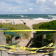 An access point to a beach closed off in Palm Beach County due to red tide on October 2.